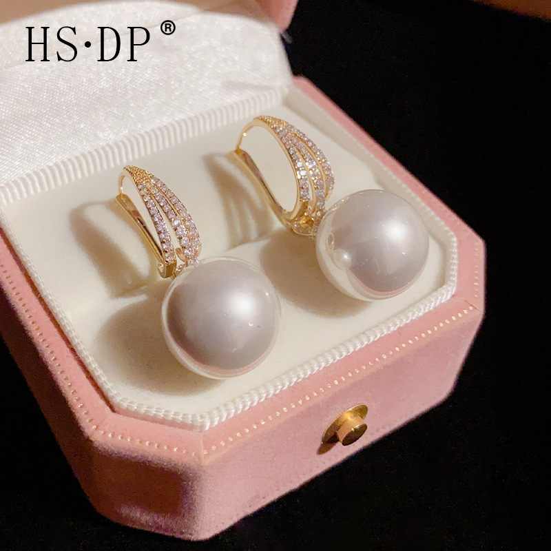 Pendientes de perlas de estilo coreano 2023 nuevo diseño de nicho de dos piezas de moda Super Flash pendientes populares online