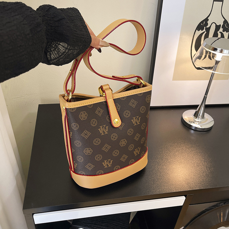 古缇蔻轻奢高级感印花子母水桶包新款潮流时尚单肩斜挎包通勤女包