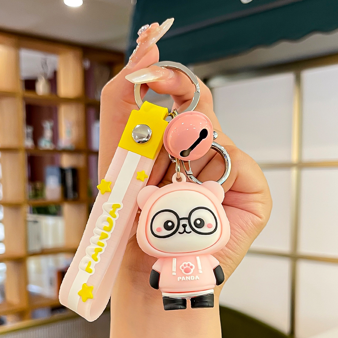 Muñeca de goma goteando bolsas escolares colgantes colgantes de muñecas colgantes de la máquina del mercado nocturno regalos al por mayor llaveros de dibujos animados