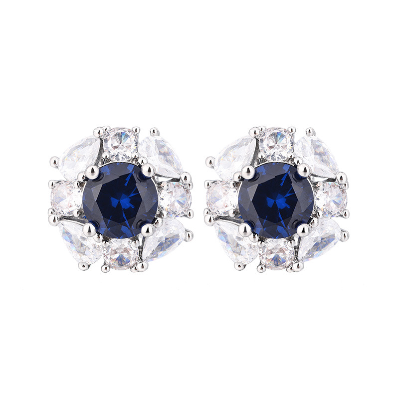 Otoño e Invierno nuevo estilo Zhuang Sheng joyería cobre fondo chapado en oro simulación azul punta cristal redondo temperamento luz lujo traje femenino 10mm7m