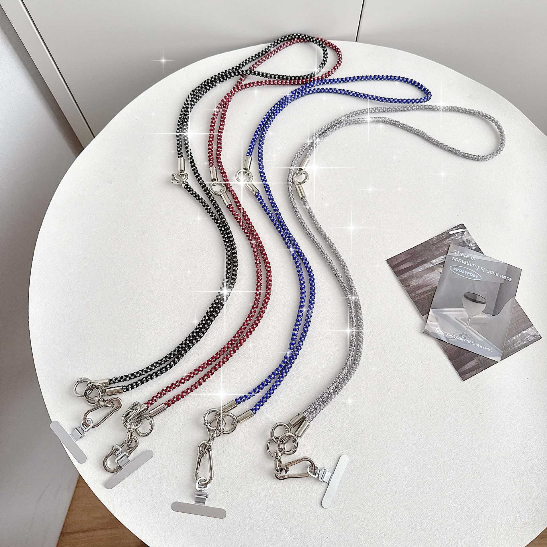 Cadena de teléfono móvil de alta gama hecha a mano de boutique, cordón de teléfono móvil de moda tres en uno de diamantes de lujo, mensajero largo/colgante