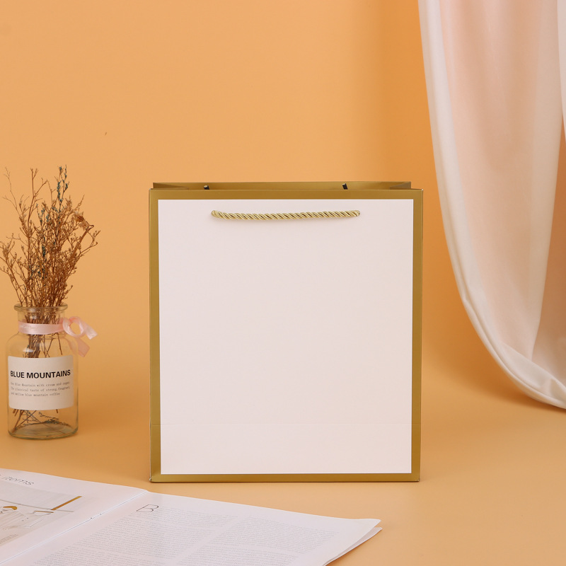 厂家新款休闲时尚简约白卡礼品服装购物袋百搭送礼手提袋批发