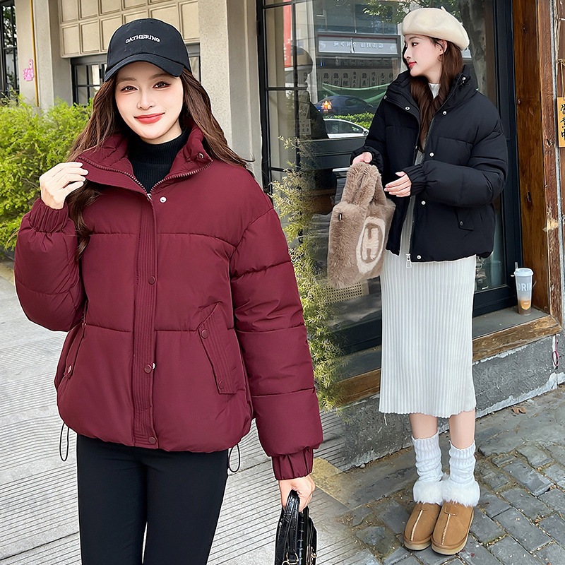 Invierno transfronterizo coreano 2025 nuevo abrigo de algodón de pluma de estilo universitario corto de mujer chaqueta de algodón de hombre pequeño Europa y América lote