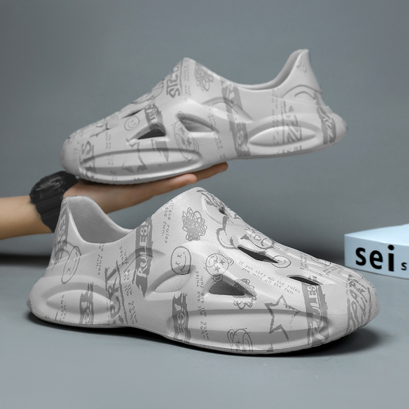 [cross-border] zapatos de cavidad camuflado graffiti de gran tamaño pareja sandalias de cabeza de paquete para hombres zapatos de playa casuales transpirables