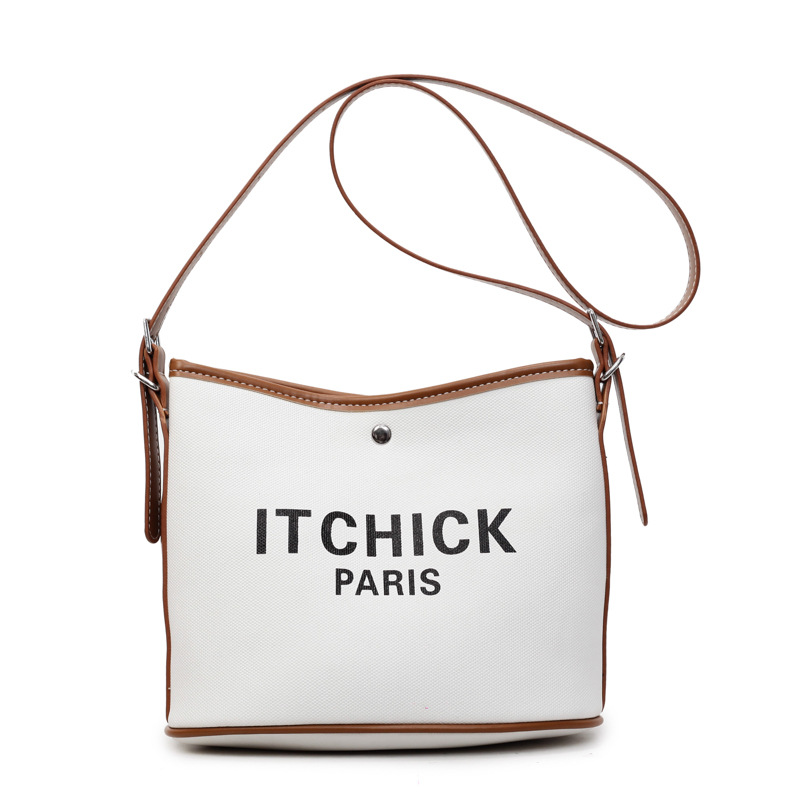 Transfronterizos de gran capacidad bolso de cubo portátil de tela de mujer impresión de letras de moda alta textura versátil mochila