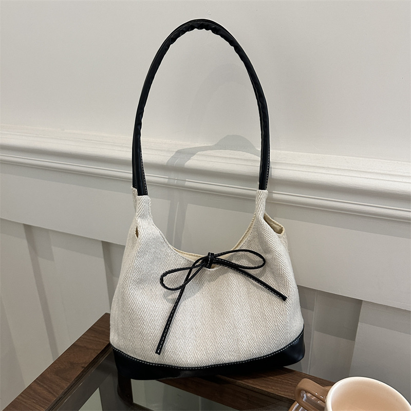 2024 nuevo nicho coreano retro empalme tela bolsa de mano bolso de hombro de gran capacidad bolso de brazo