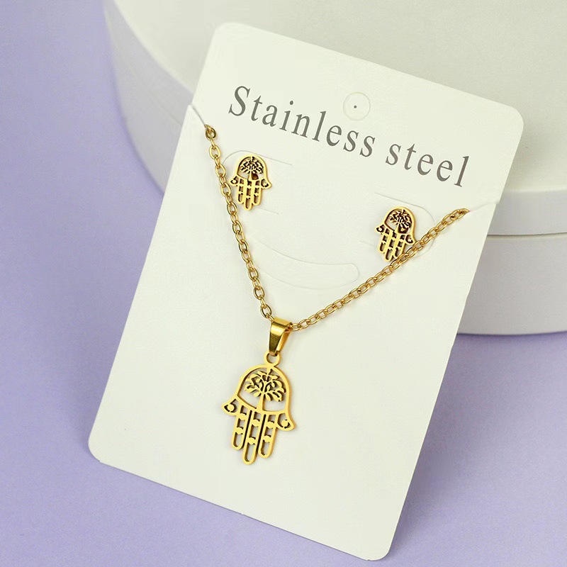 Net Red Butterfly Love Cross Personalidad Simple Juego de joyas de acero inoxidable Pendientes de oro Juego de collar al por mayor