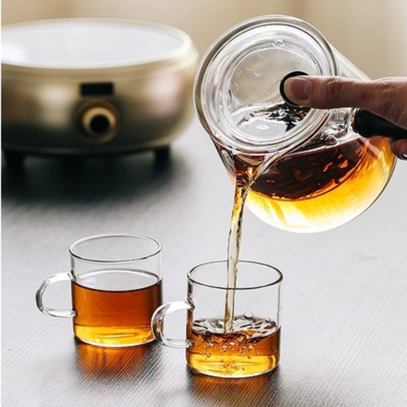 Fabricantes al por mayor lado poner la tetera de vidrio tetera con filtro de vapor tetera Puer tetera