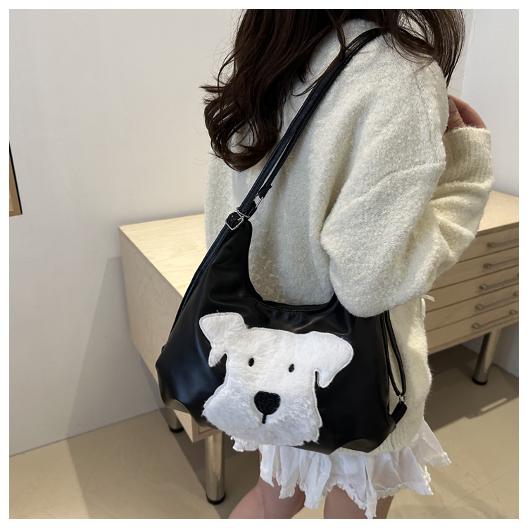 The new autumn and winter 2024 fashion cartoon backpack with simple, individual and niche design, single-shoulder bag and commuter tote bag undefined