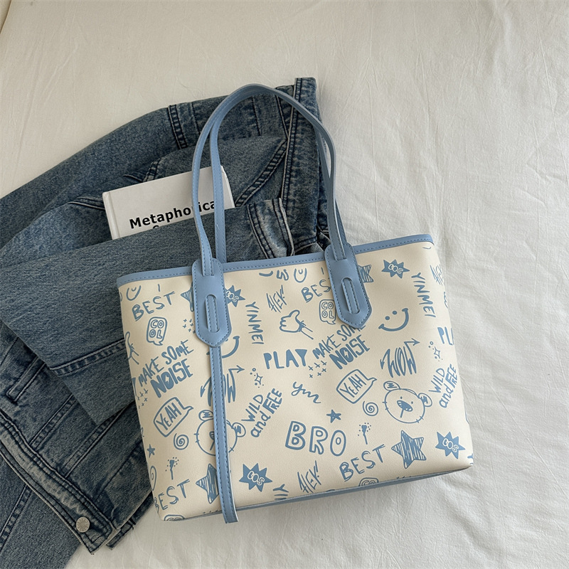 Bolsa de hombro de gran capacidad para mujeres, bolso de alta calidad, bolso grande, 2024 nuevo estilo de moda, bolso de clase de graffiti