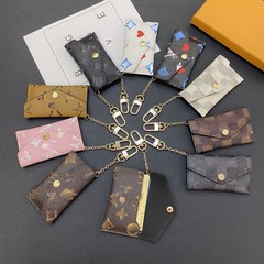 古い花の潮の金の経典のフックの財布は封筒のカードを押して小銭入れの財布を収納します。