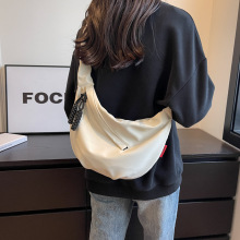 纯色大容量帆布包包女新款休闲通勤单肩包轻便运动睿营斜挎饺子包