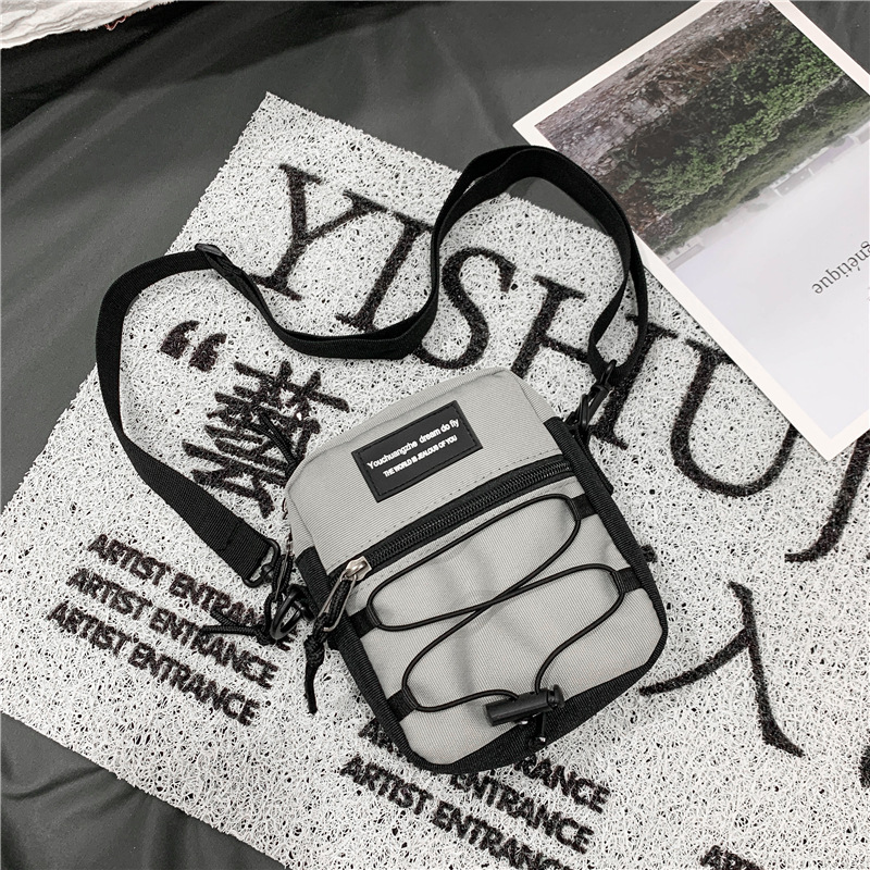 67g Weight Zipper Closure Type Single Shoulder Strap Strap Type Crossbody Bag Bags Type Nylon Material Letter Pattern Streetwear Style Square Shape Khaki, Light Grey, White, Black Color Small Size Small Nylon Letter Streetwear Square Zipper Crossbody Bag 75