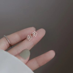 Flower earrings S925 sterling silver needle mini hollow flower earrings niche design simple sleep-free earrings