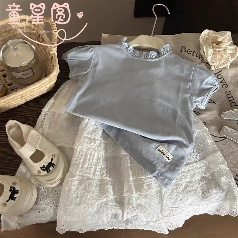 Estrella infantil coreana nueva primavera y verano ropa de niñas niños encaje hueco falda de busto falda de aire al por mayor de la moda