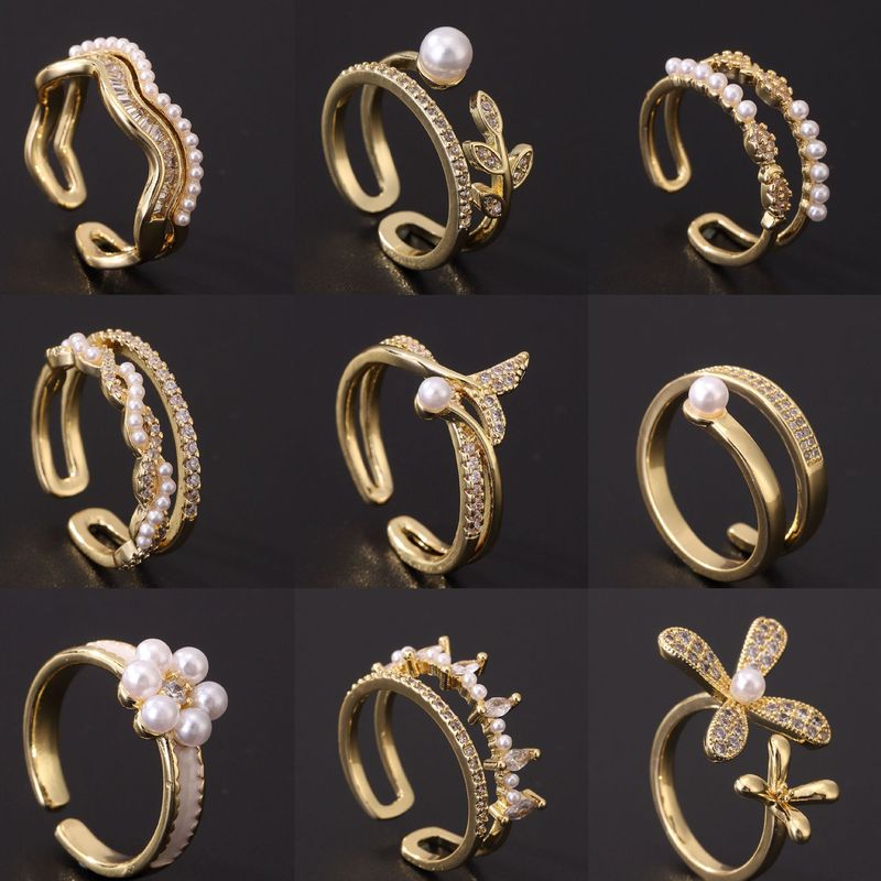 High-end Niche Light Luxury Design Women's Pearl Ring European and American Fashion Creative Gold-plated Zircon Adjustable Opening Ring High-end Niche Light Luxury Design Women's Pearl Ring European and American Fashion Creative Gold-plated Zircon Adjustable Opening Ring