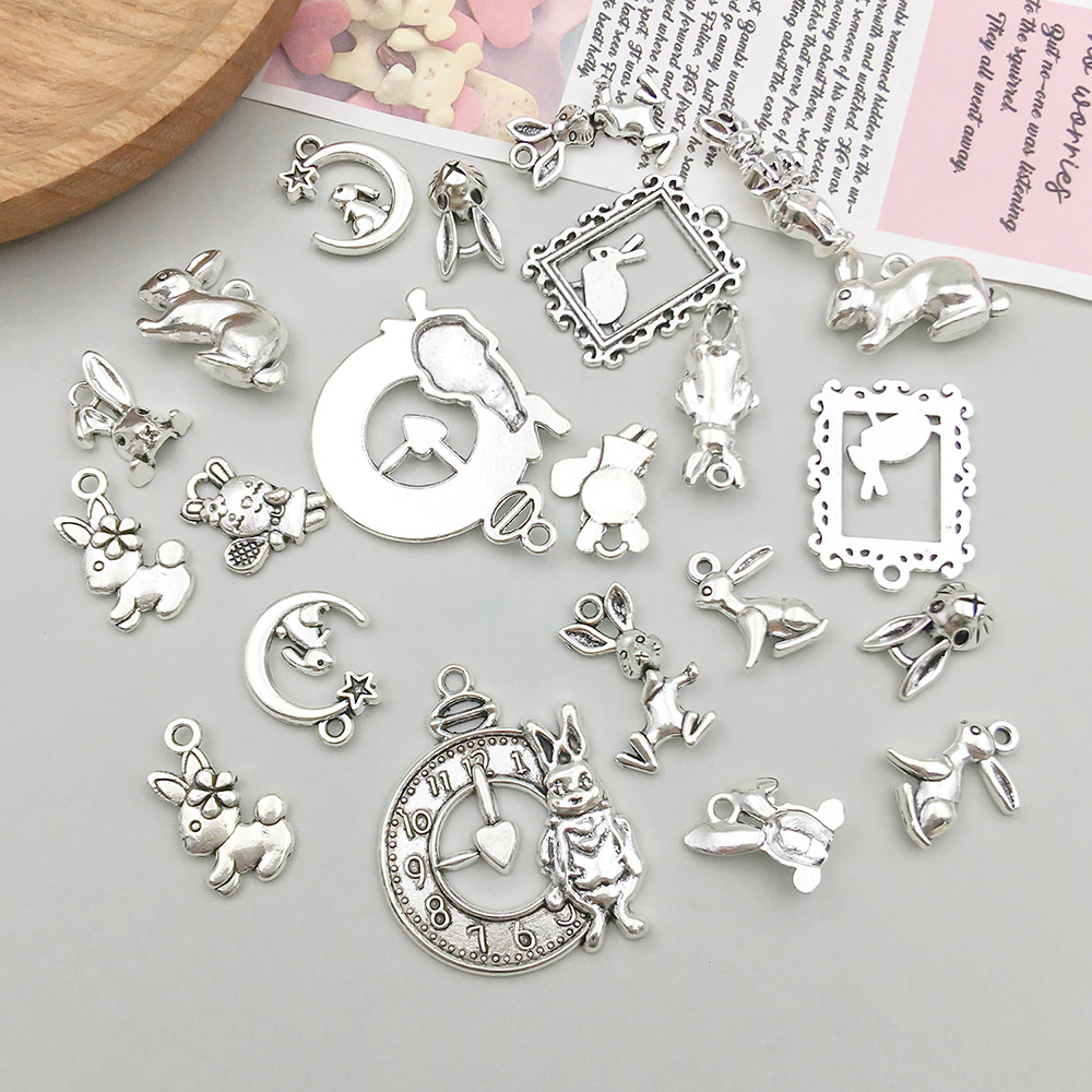 2g Weight Pendant Jewelry Making Type 17*24mm Jewelry Making Size DIY Jewelry Accessories Classification 11 Models, 2 Each, 22/Bag Quantity Zinc alloy Material Rabbit Pattern Polished Finish Plating Design Cute Style 11 Models, 2 Each, 22/Bag 17*24mm Zinc Alloy Rabbit Polished Pendant 7
