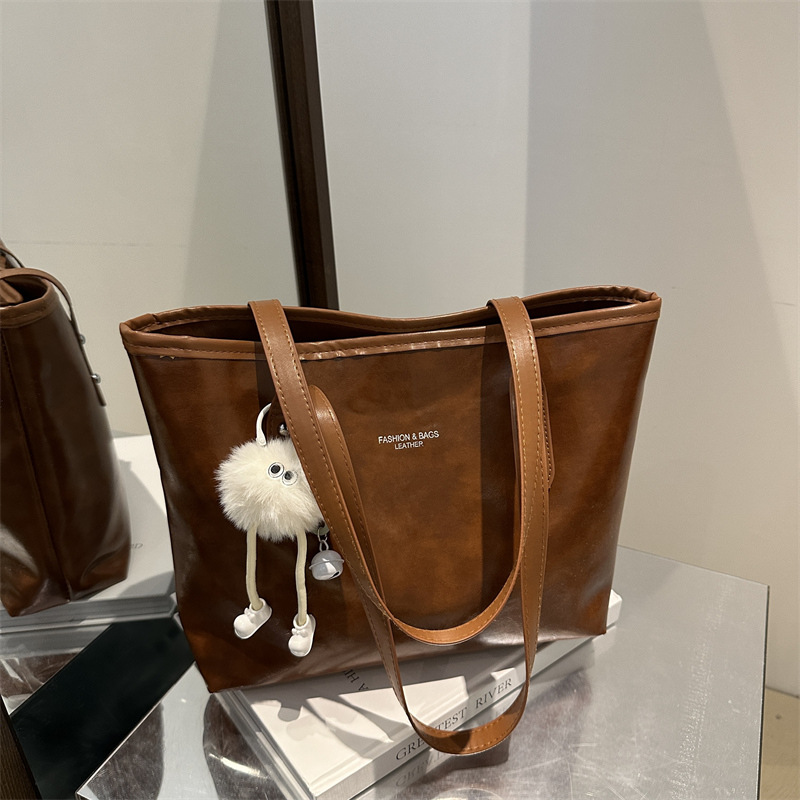 Bolso especial de cuero brillante de alta gama de moda para mujer 2024 nuevo bolso de hombro de gran capacidad para viajeros