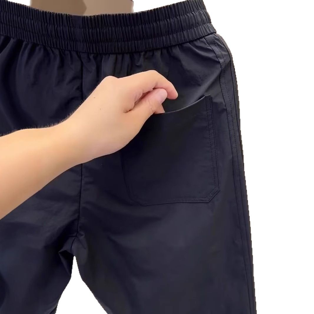 Pantalones cortos transpirables de verano de alta calidad, moda masculina, juveniles, pantalones casuales sueltos.