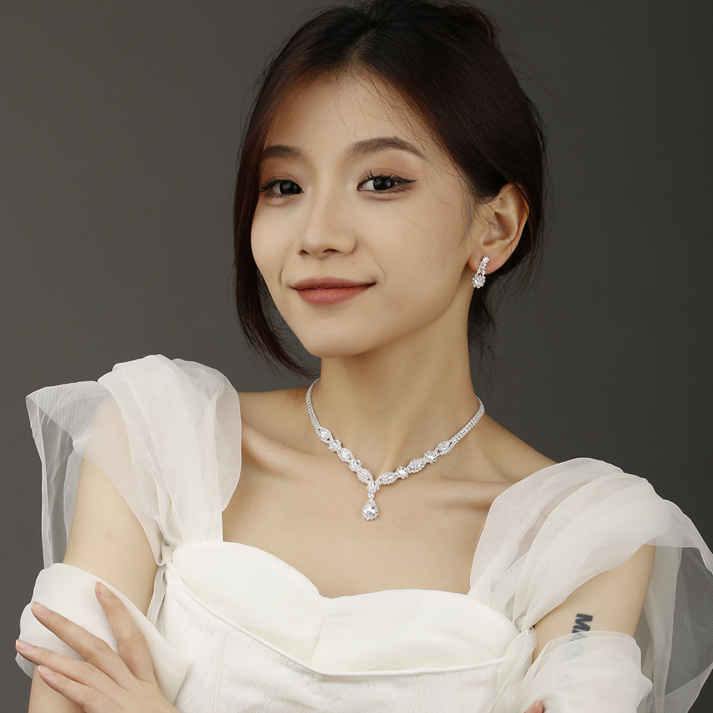 Joyería europea y americana al por mayor suministro transfronterizo circón joyería nupcial pendientes pulsera collar conjunto