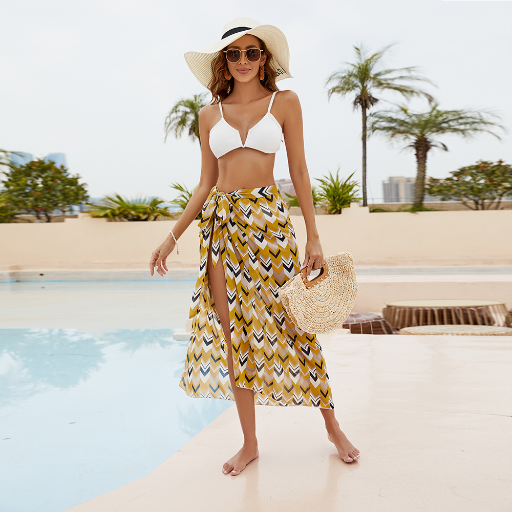 Verano nueva gasa impresa estilo retro de vacaciones de una pieza de adelgazamiento irregular vestido de abrigo de playa blusa