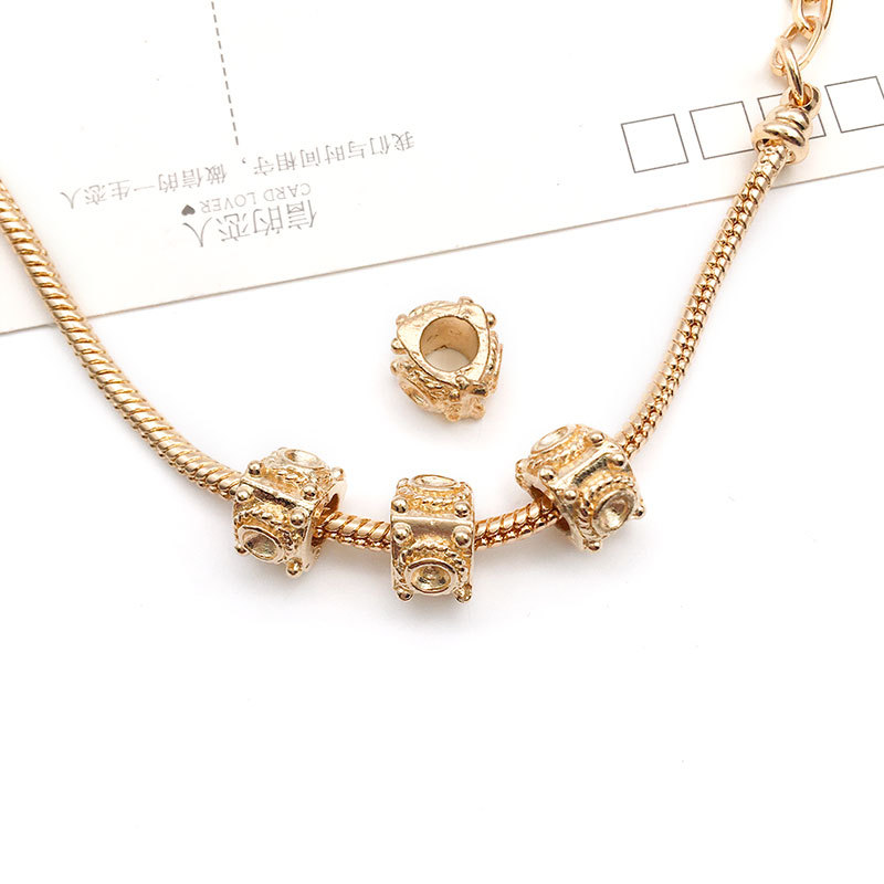 1 europeo y americano gran agujero perlas KC oro panjia gran agujero granos aleación perlas perforadas collar joyería accesorios cuentas sueltas al por mayor