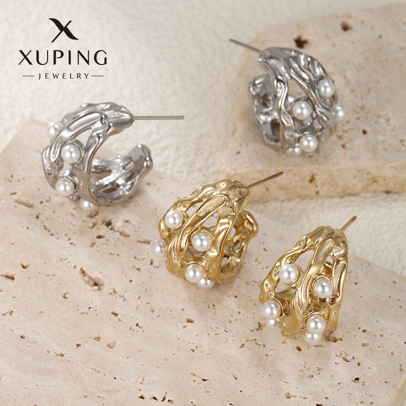 Xuping Xiaozhong ins viento hueco perla perlas perlas exageradas orejetas femeninas sensación de alto nivel lujo ligero aretes de moda atmósfera