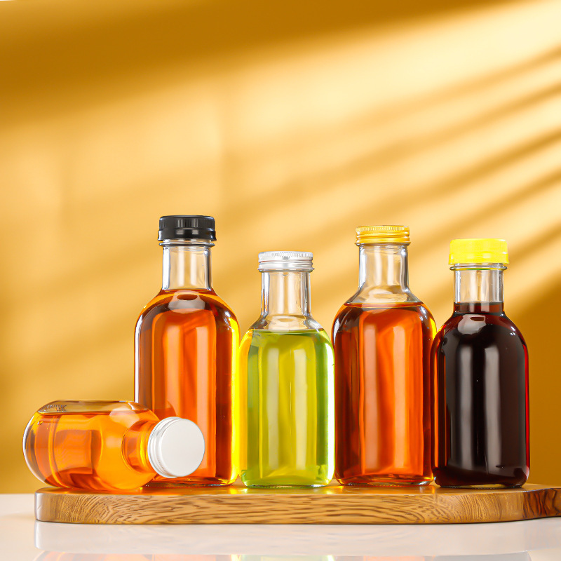 现货圆形饮料瓶透明玻璃果酒瓶密封加厚多规格牛奶果汁分装瓶批发