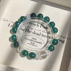ファッションのシンプルな緑瑪瑙の手串の経典の赤い転運珠国風の手串の復古の気質は白い新商品の卸売りを現します。