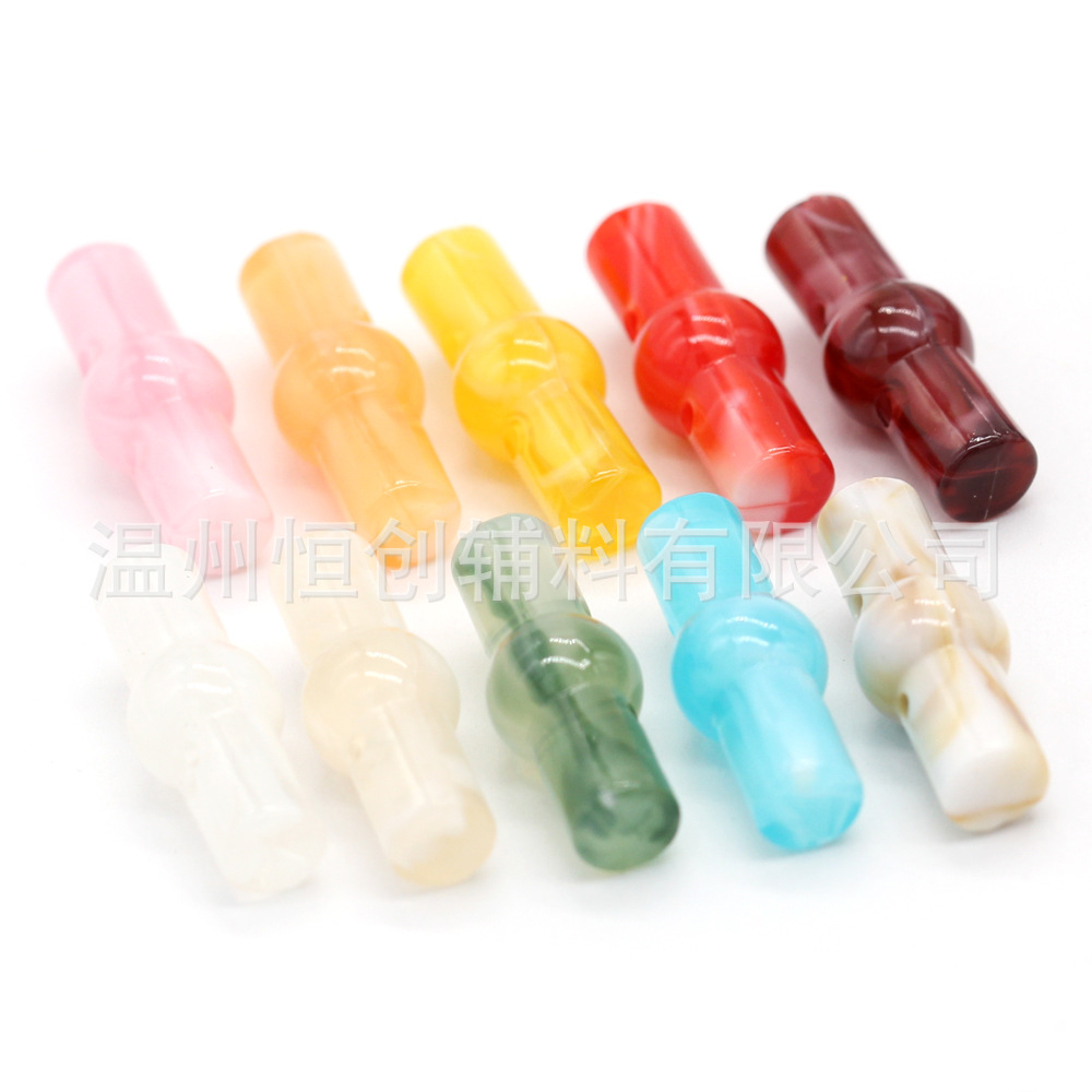 25x9mm brillante Hengchuang botón de resina cilíndrica de dos agujeros botón de estilo nacional suéter de punto botón de color de bricolaje al por mayor