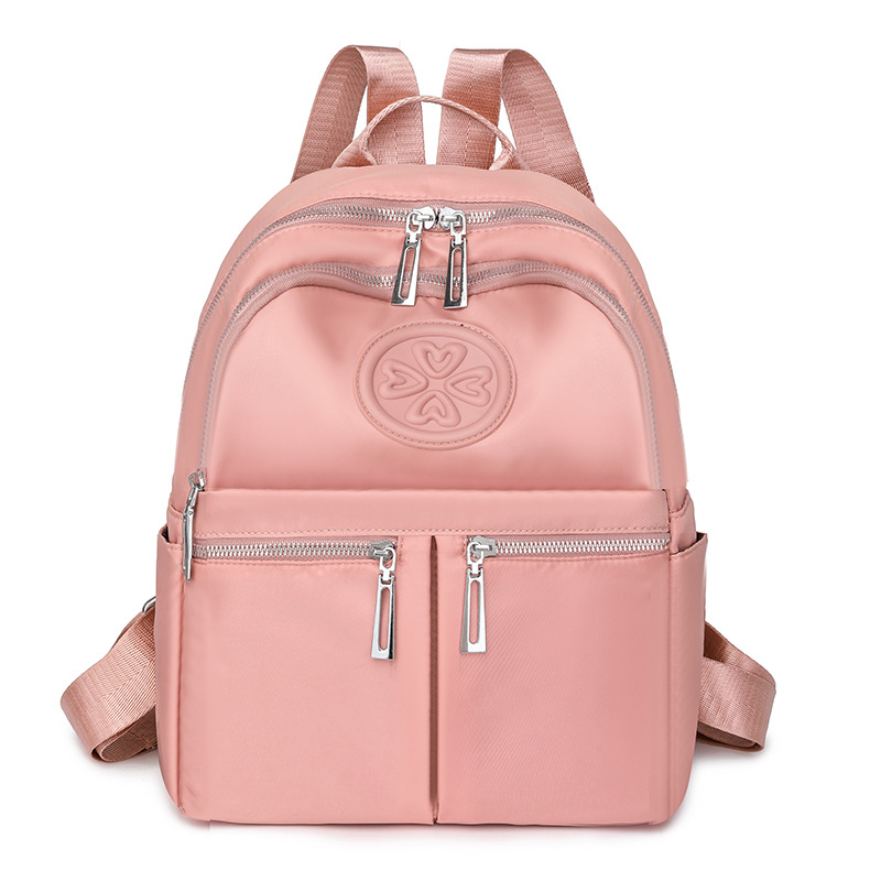 2025 nueva mochila de nailon casual para mujer, mochila de viaje al aire libre de gran capacidad en relieve de moda, mochila escolar para estudiantes