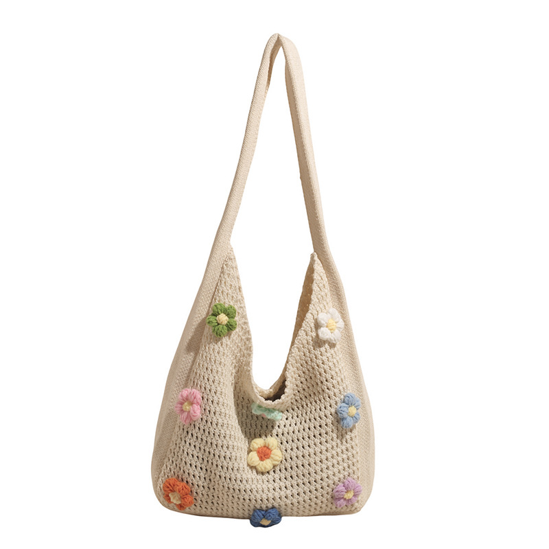 Versión coreana del bolso de nicho 2025 verano nuevo bolso femenino Xuan Yafeng flor bolso de hombro hueco de punto