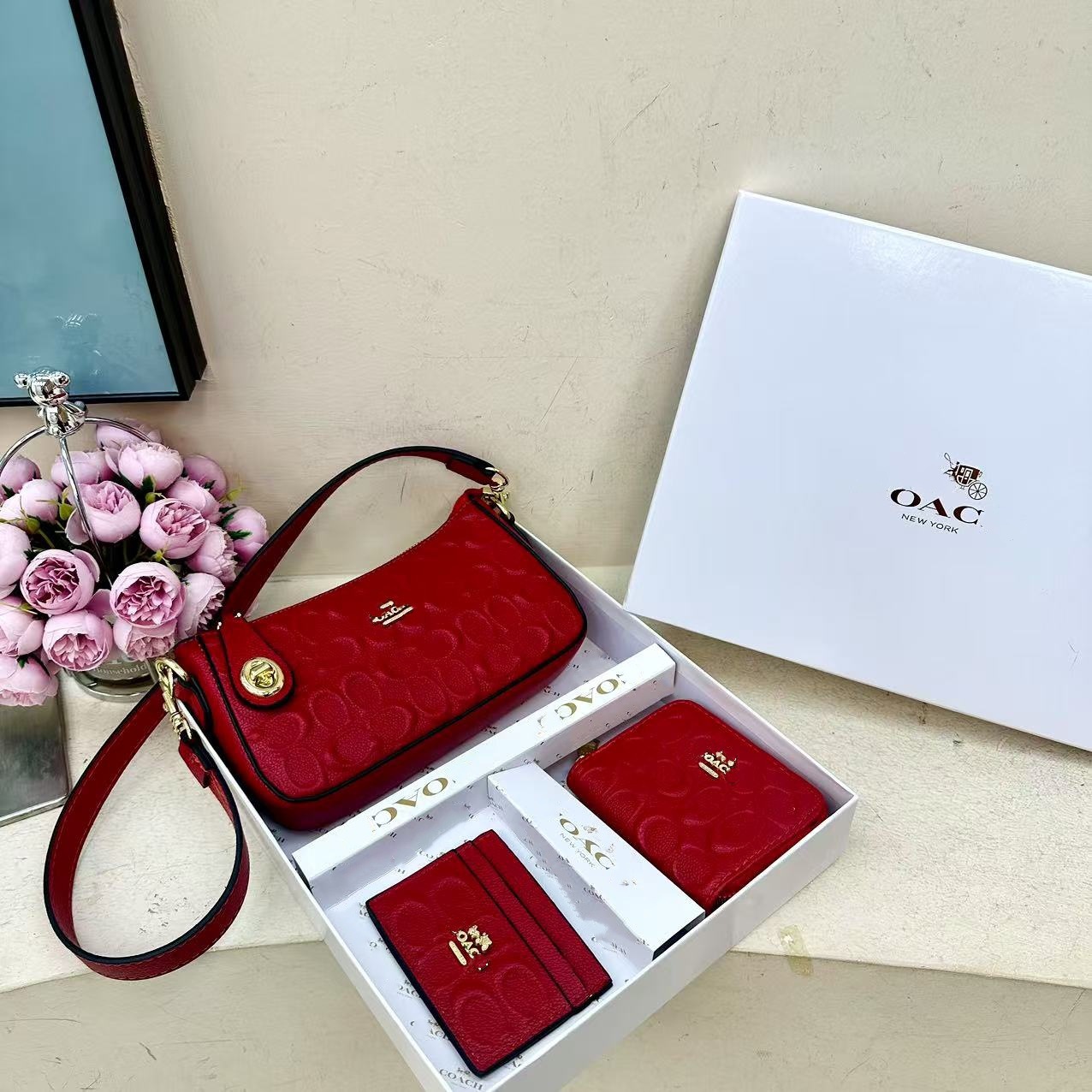 2025 nuevo Kome bolso brazo cartera de tres piezas conjunto de co caja bolsa de tarjetas de comercio exterior transfronterizo bolso de donación