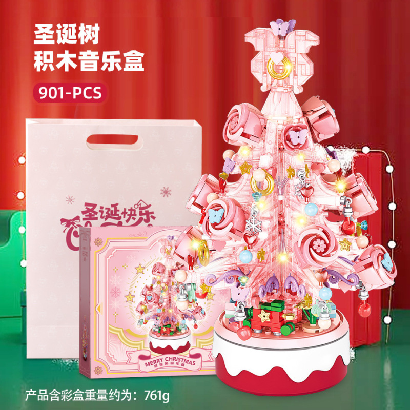 子供のクリスマスツリーの照明のオルゴールの小さい粒子の益智は積み木のおもちゃのクリスマスを詰めてアイデアの贈り物を並べます。|undefined