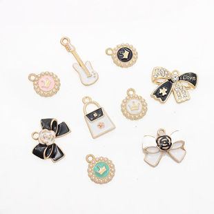 Xipeng jewelry diy accessories drop oil alloy European and American black and white small fragrant style bow bag pendant earrings