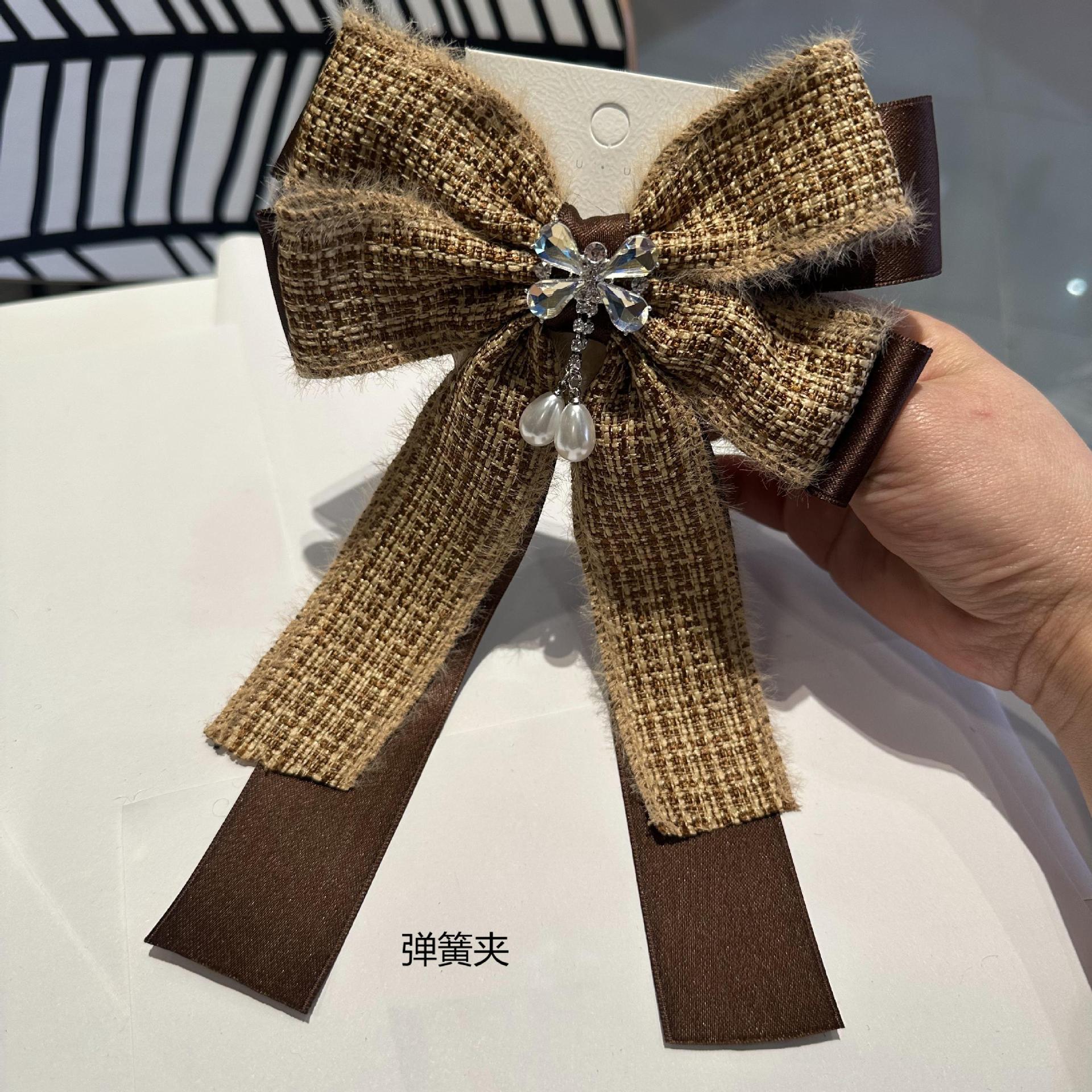新款法式高級感格子布藝彈簧夾毛絨蝴蝶結小香風韓國甜美氣質頭飾