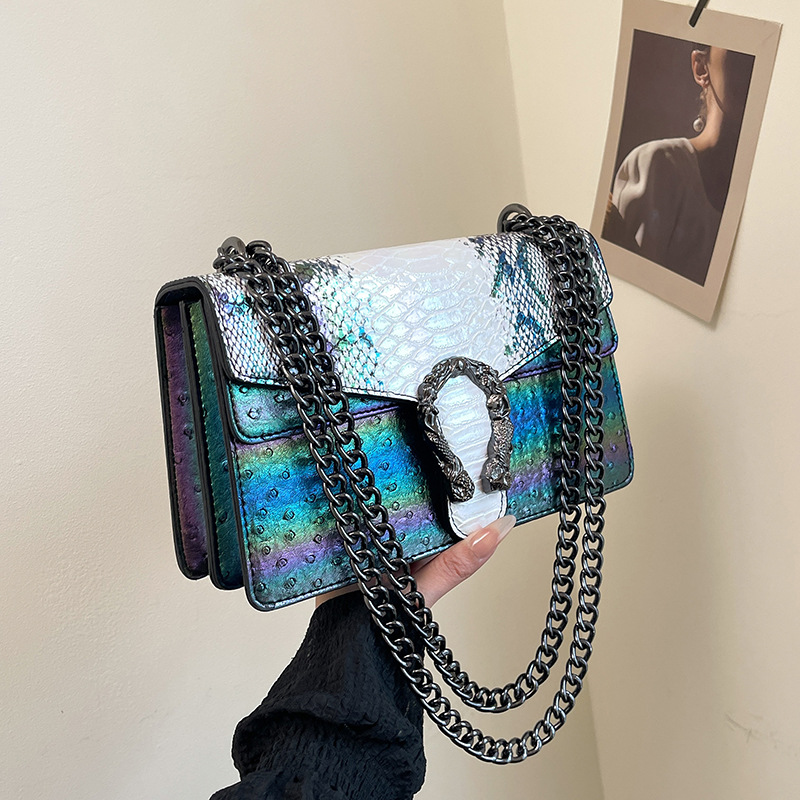 Bolsa de cadena de textura transfronteriza 2025 verano nuevo bolso femenino patrón de serpiente patrón de avestruz bolso de hombro bolso de mensajero de color de contraste de alta calidad