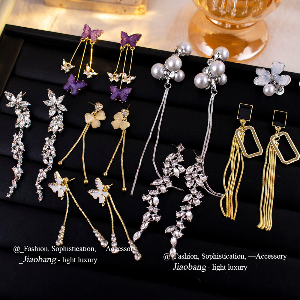 Pendientes largos con flecos elegantes y diamantes con aguja de plata Pendientes de todo fósforo de temperamento de nicho Pendientes simples y ligeros de lujo de alta gama Mujeres