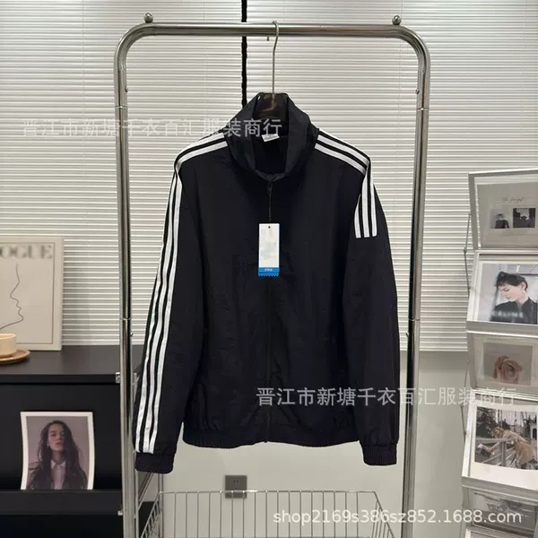 Foreign trade wholesale spring and autumn men's and women's windbreaker jacket jacket windproof sports stand collar loose woven jacket 7534