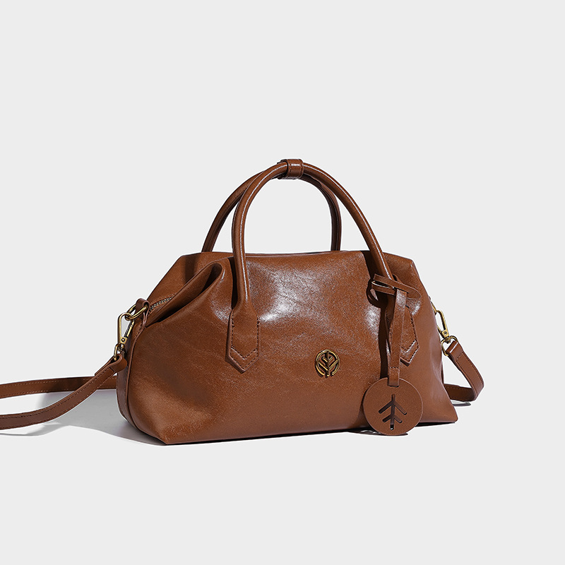 Bolsos de Boston de piel bronceada vegetal retro bolsos de bolera portátiles bolsos de mujer otoño e invierno 2024 nuevos bolsos de Usnea de hombro único