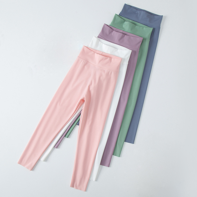 Pantalones de tiburón para niñas primavera y otoño ropa de bebé delgada Pantalones deportivos de corte casual niños medianos y grandes estiran pantalones de yoga fabricante