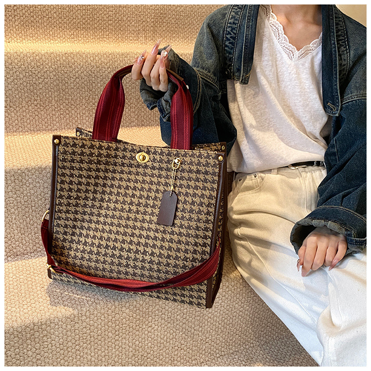 Bolso de patrón leopardo para mujeres 2026 nueva moda retro transfronteriza bolsa de viaje bolsa de tela de bloqueo mochila de hombro