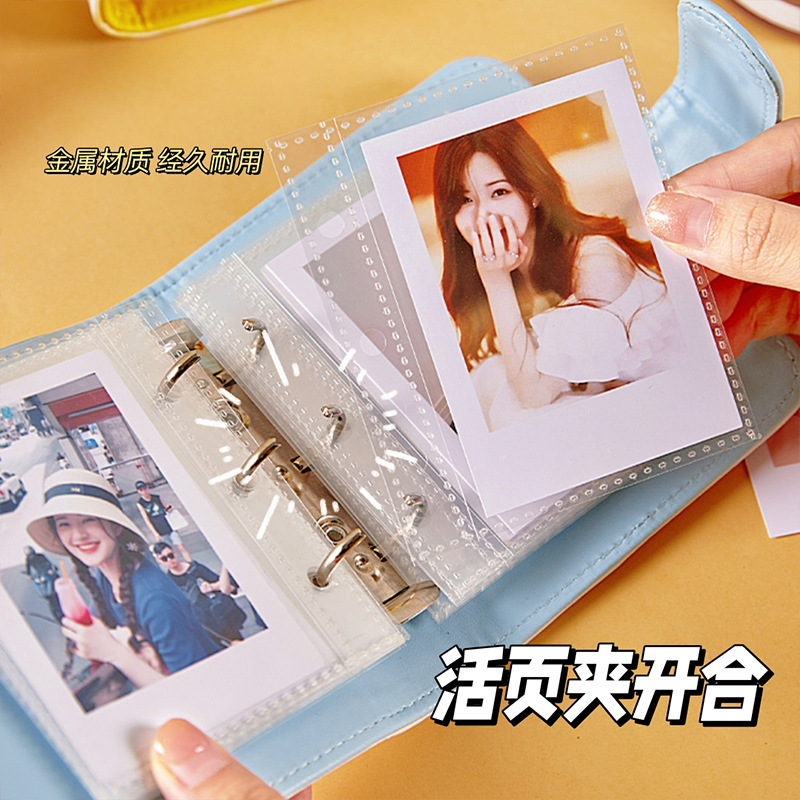 El nuevo libro de tarjetas de cuero Kapibala, hebilla magnética de alto valor, cuadrícula de un palacio, álbum de fotos pequeño portátil, libro de almacenamiento de tarjetas pequeñas Idol