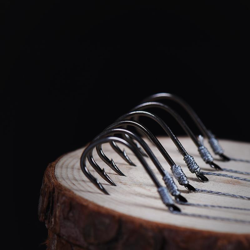 Gancho de pescado de Isseni, gancho de pesca, línea de doble gancho, línea de defensa contra la mordida de caballos, fábrica de cadena de suministro de comercio al por mayor