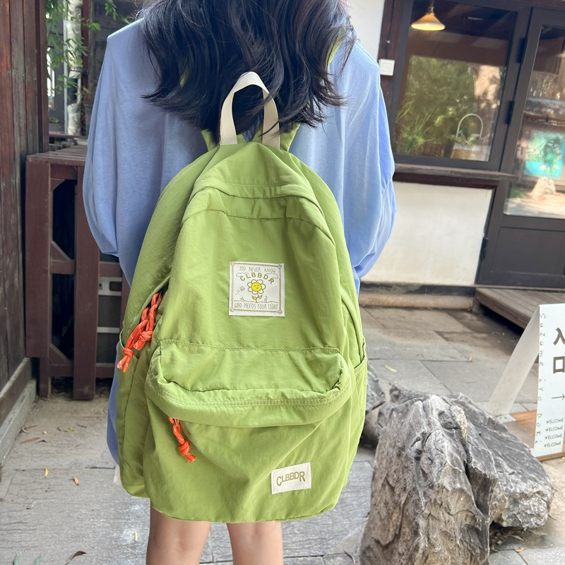2024 otoño nuevo estilo ins versión coreana de la mochila de la escuela secundaria de gran capacidad estilo japonés contraste color sólido mochila doble al por mayor