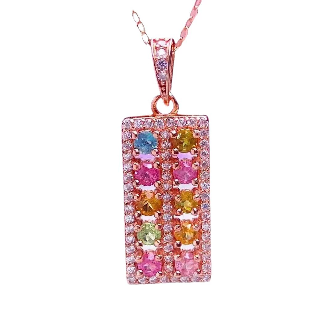 Organic tourmaline pendant, stone inlay, silver 925 sample, style