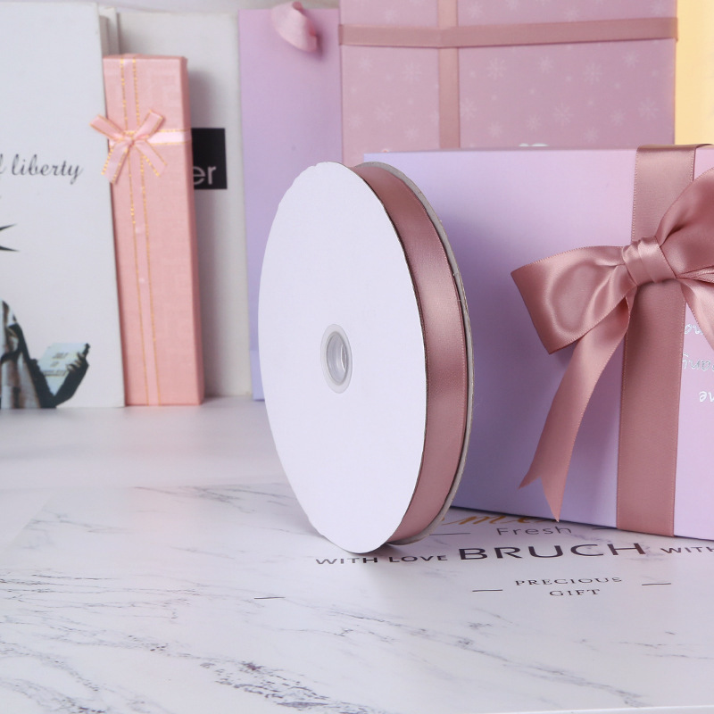 Un solo lado de poliéster cifrado cinta de boda festiva embalaje cinta accesorios de ropa 161 lotus polvo cinta de color fábrica al por mayor