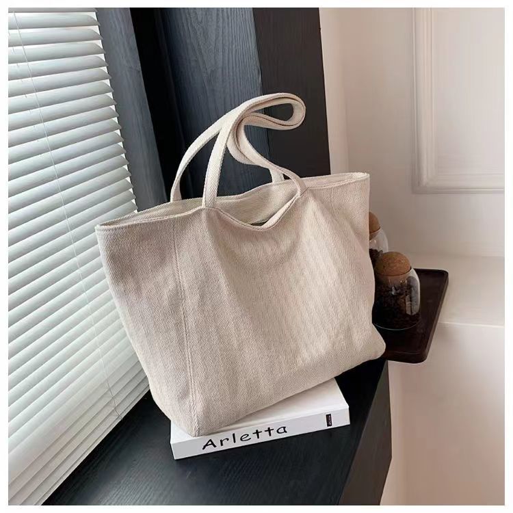 Pequeña bolsa de lona a rayas frescas de hombro para mujeres, bolsas escolares de clase de gran capacidad, bolsas de compras japonesas y coreanas, bolsas especiales.