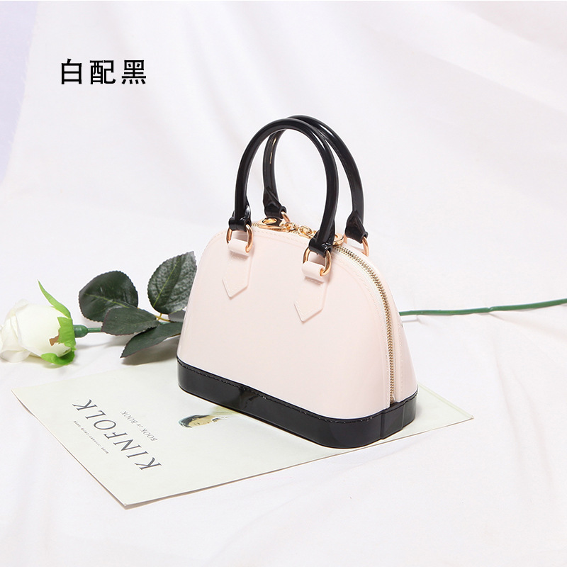 2025 primavera y verano estilo caliente moda casual niños dulces bolsa de gelatina mini bolso de mensajero de un solo hombro variedad al por mayor