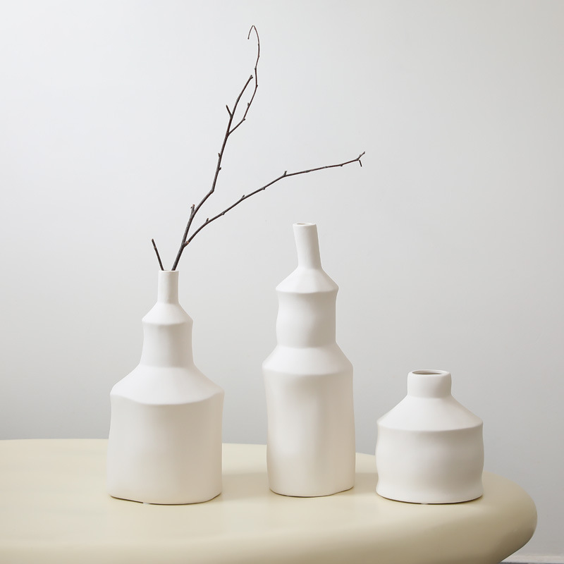 Viento tranquilo de cerámica blanca y negra ornamentos decorativos para la sala de estar decorativos para el hogar flor seca flor de escritorio